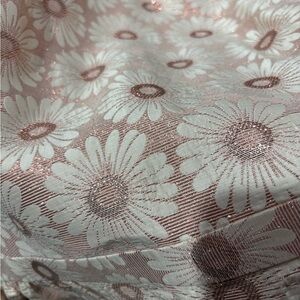 Cute Boden party dress in a metallic thread daisy print
Size 12 above knee